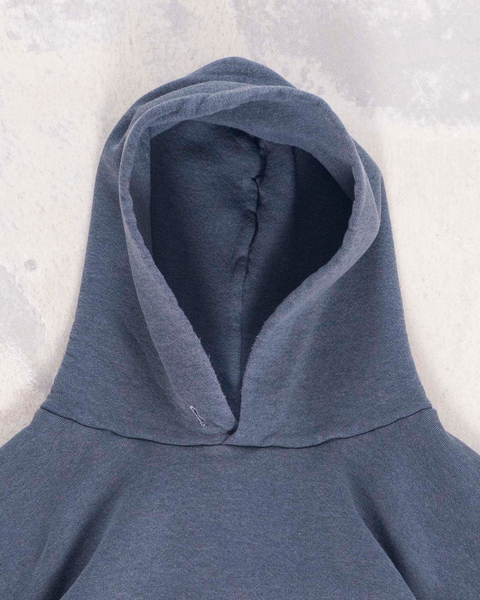 http://epilogue.store/cdn/shop/files/EPILOGUE_STORE_90S_RUSSELL_ATHLETIC_EXTRA_LARGE_GREY_HOODIE_FRONT_2_CURATED_VINTAGE_SUPPLY_1200x1200.jpg?v=1685116944